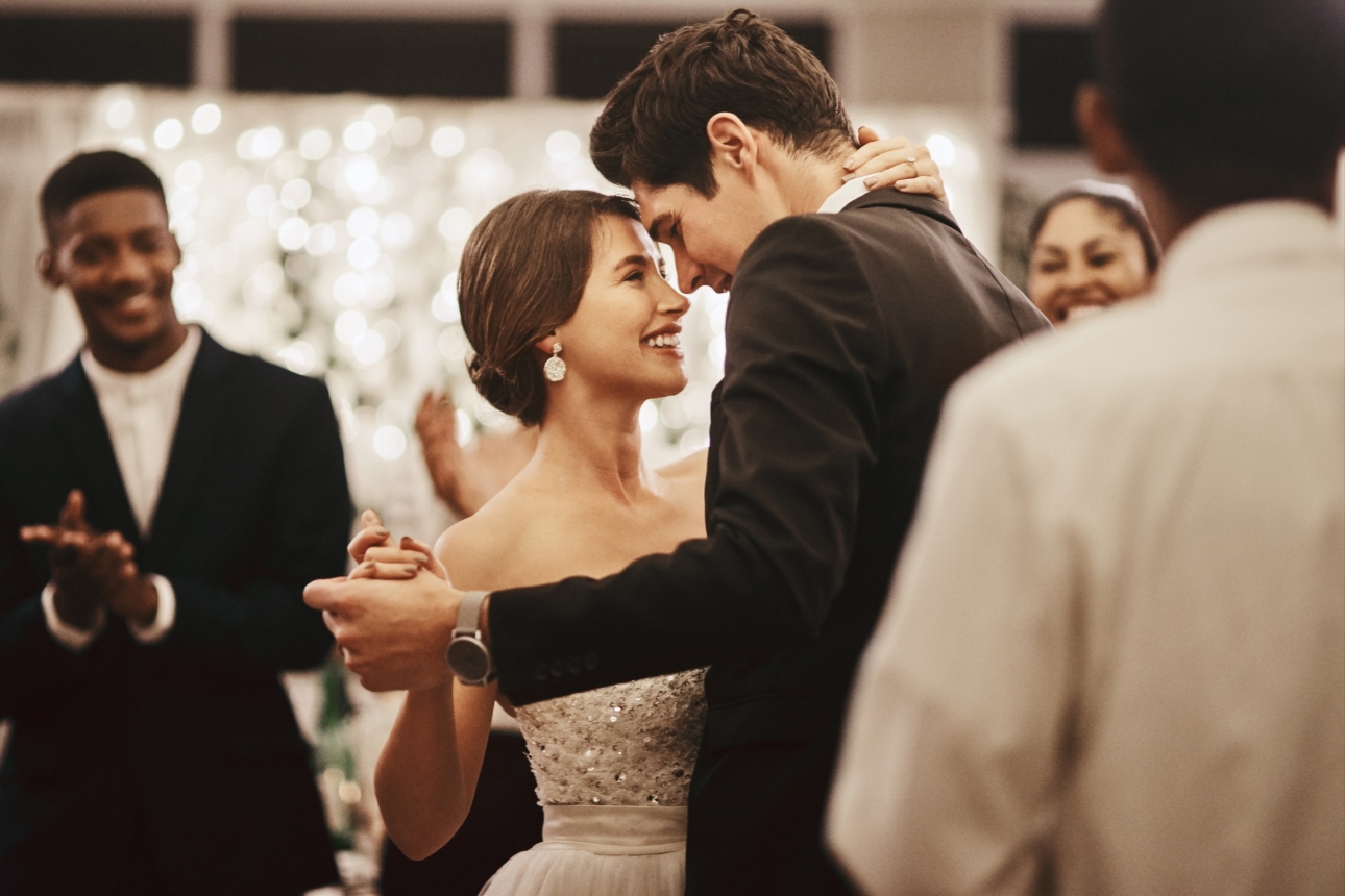 Wedded couple enjoy their first dance