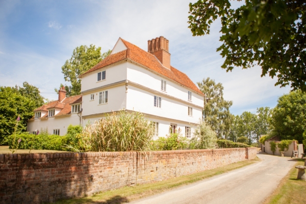 Houchins Coggeshall, white building in the gardens