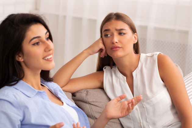 Two female friends talking