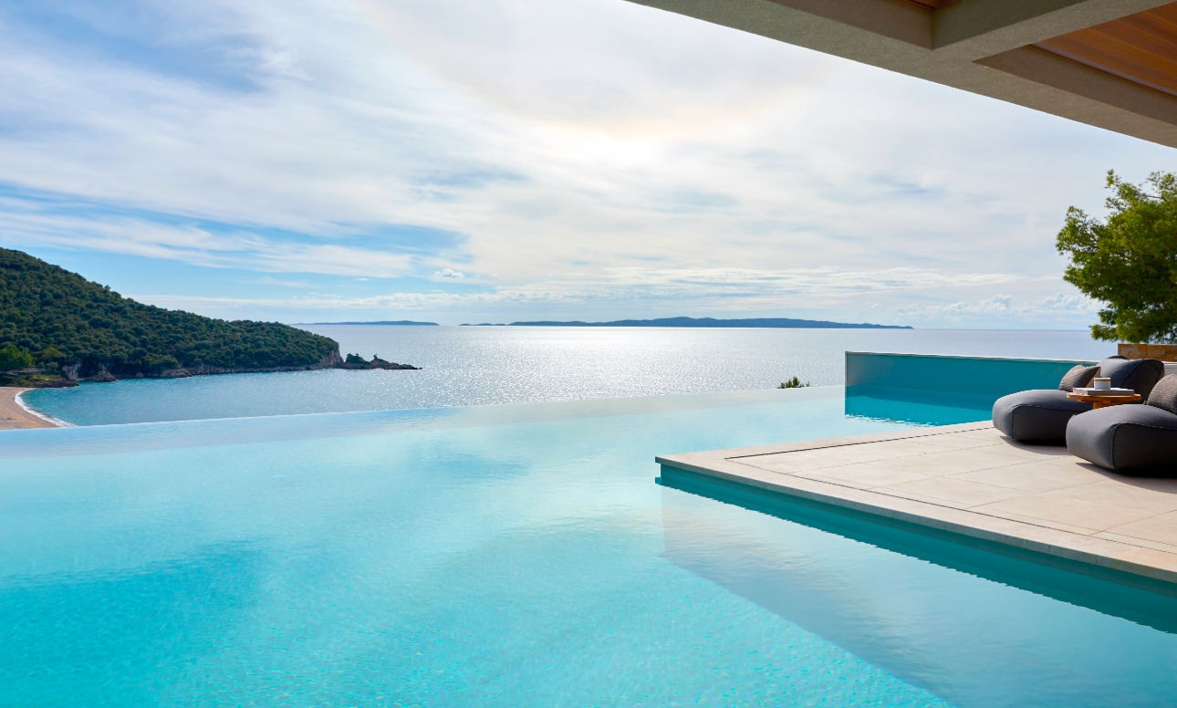 view from suite looking out to pool and sea