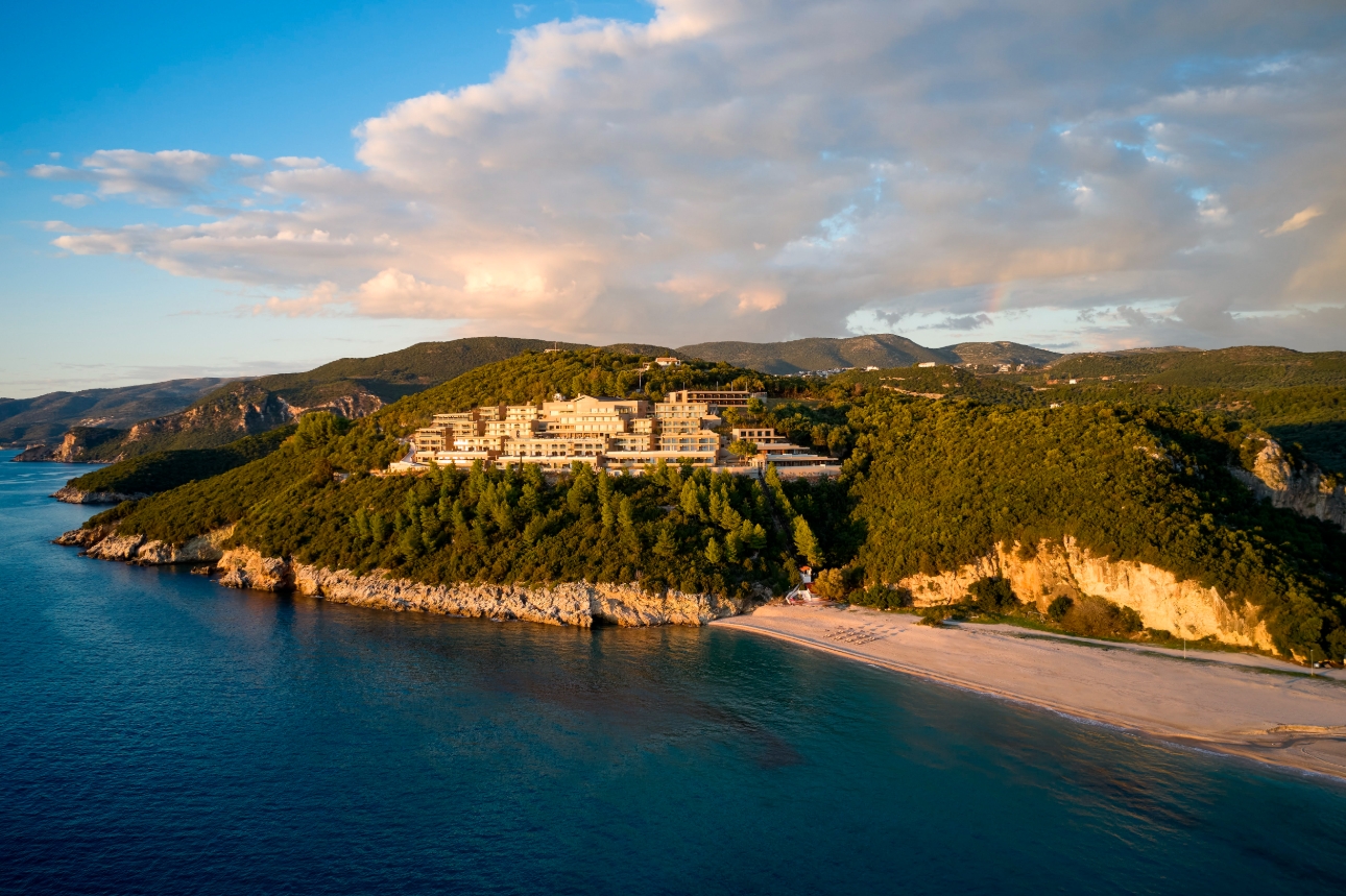 hotel perched in hills with sea and beach view