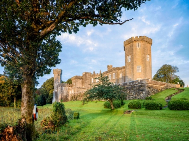 castle surrounded by manicured lawns