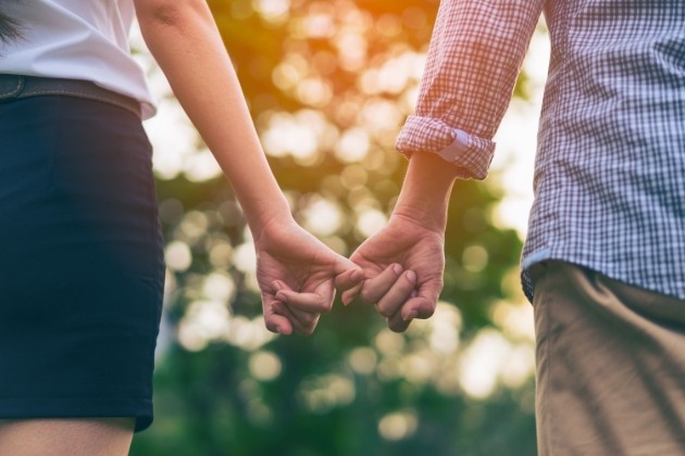 couple holding hands