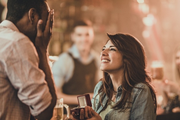 woman proposing to a man 