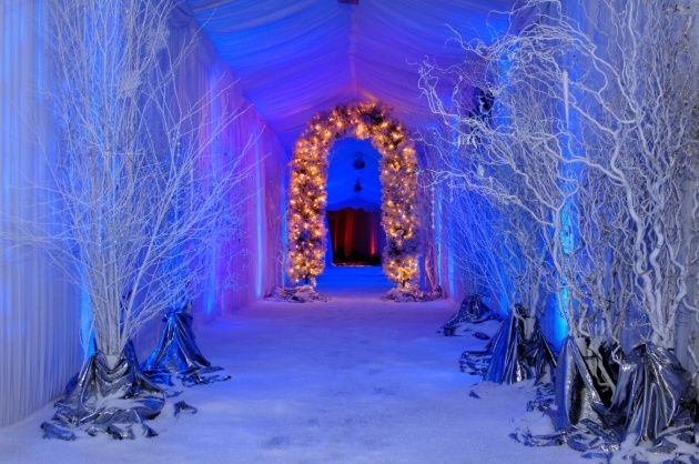 white sticks and fairy lights at marquee entrance and tunnel