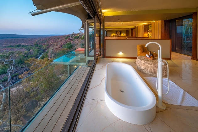bathroom in lodge with safari views