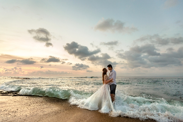 bride and groom on a beach