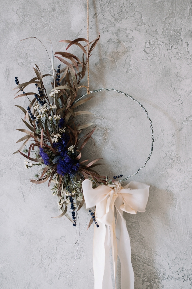 hanging circle garland with dried flower decoration and hanging ribbon