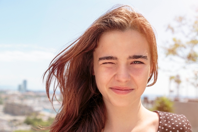 woman squinting in the sun