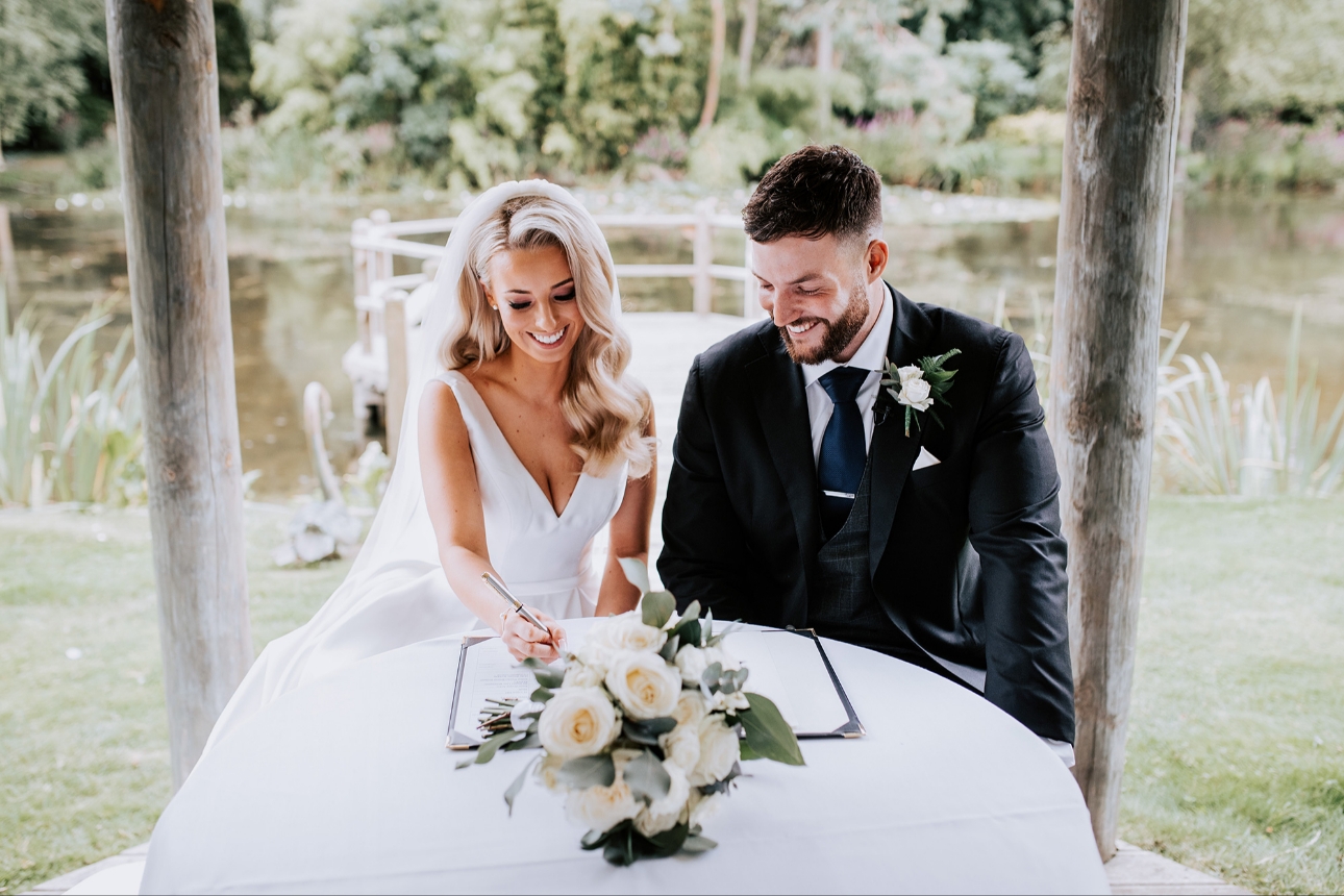 Couple signing the register