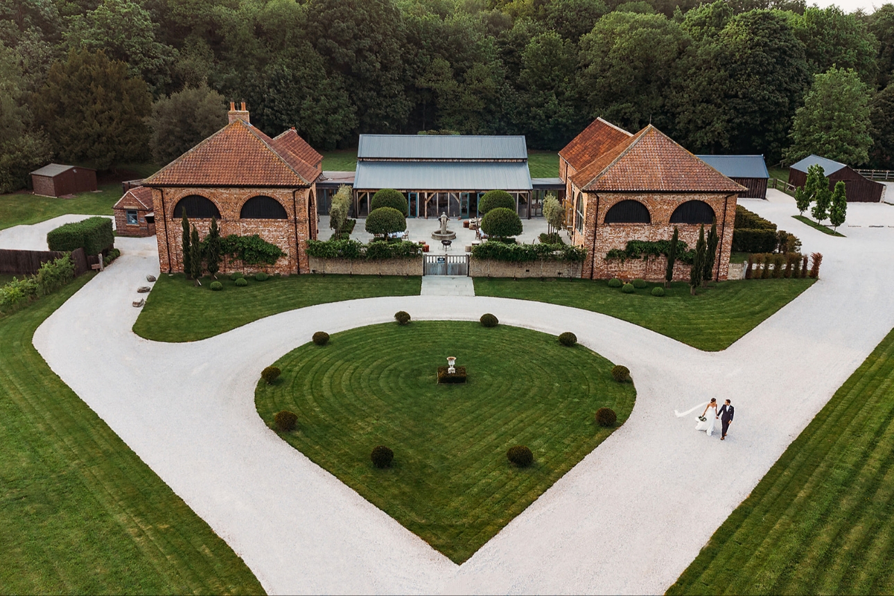 Aerial shot of venue and couple