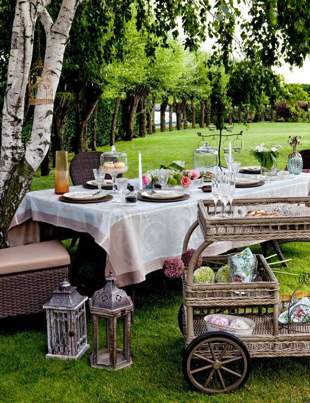 wedding reception table outside night lit-up by fairy-lights