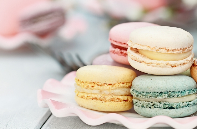 pastel coloured macarons on a plate
