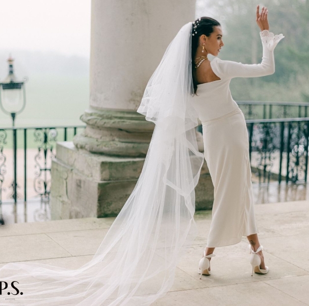 A model wearing a dress from P.S. Bridal's new online booking platform The List