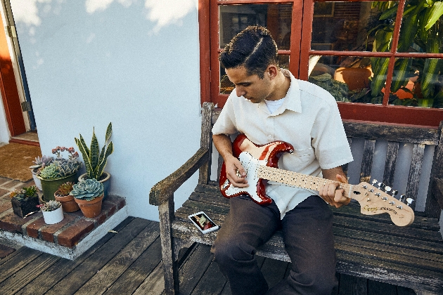 Man playing a guitar