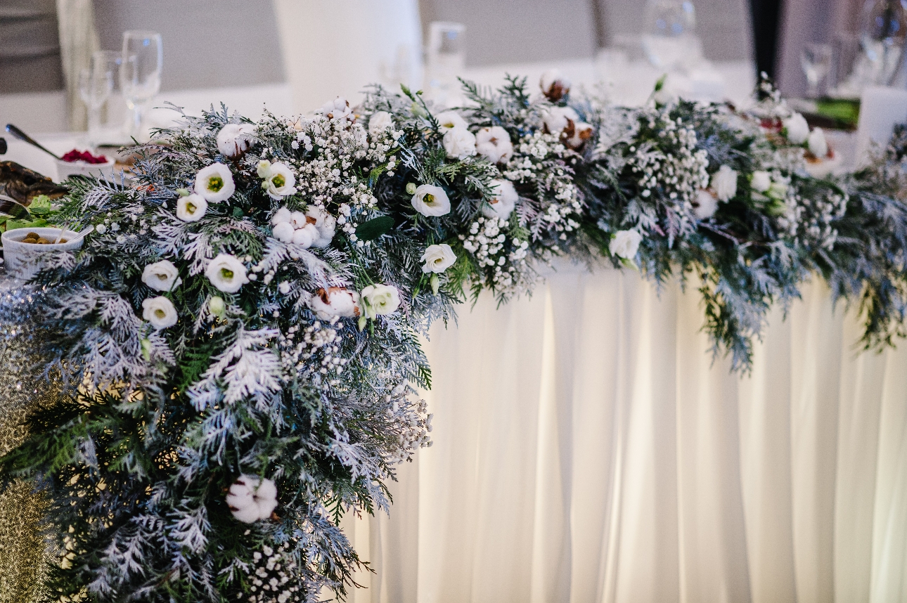 winter foliage draped on a table