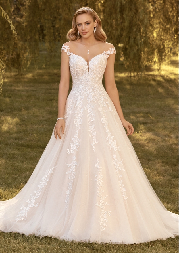 model in sweetheart necked lace wedding gown