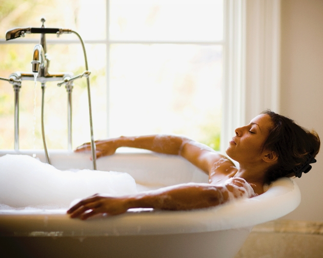 woman relaxing in a bubble bath.