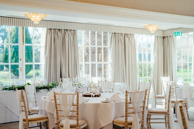 reception room with tables and neutral decor