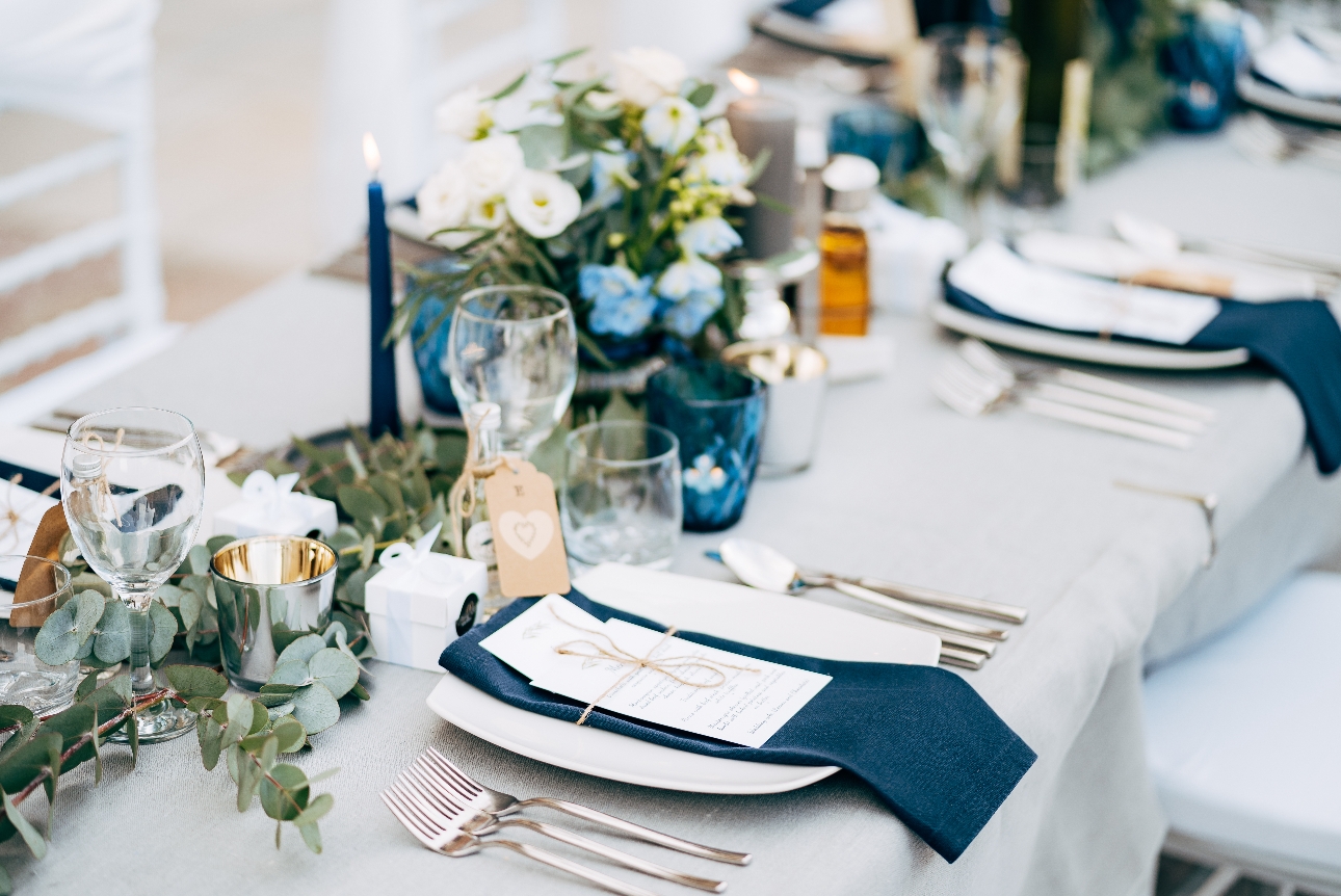 blue themed table setting at a wedding reception