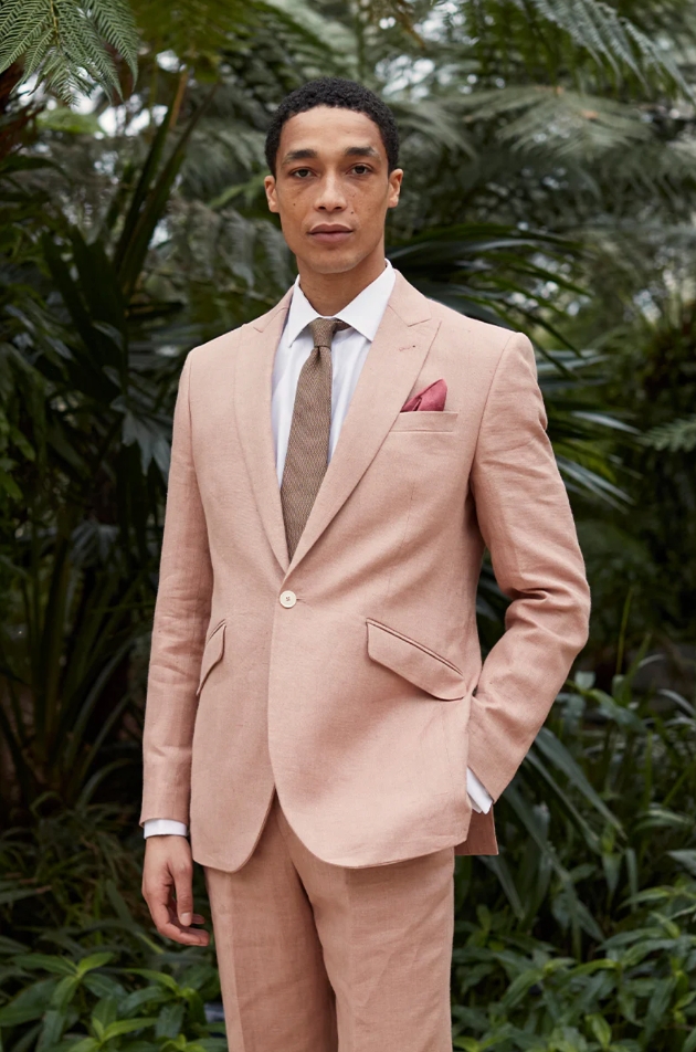Man wearing a pink suit