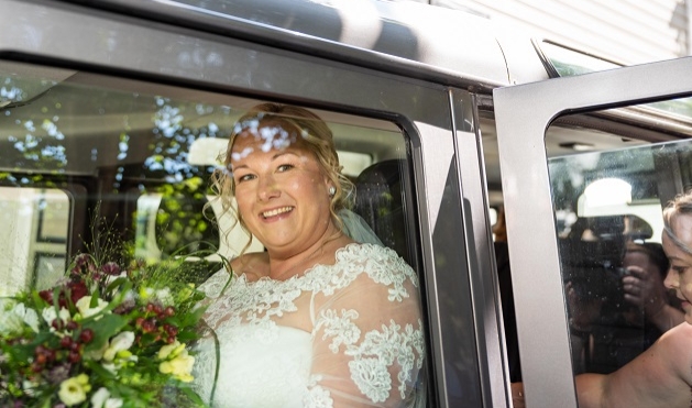 Bride in car