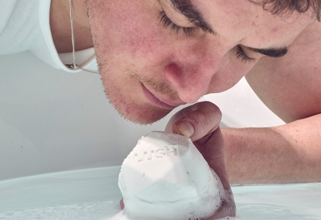 man smelling the saltbomb as it dissolves