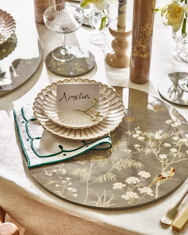 place setting at table with placemat and peppermill and pate selection