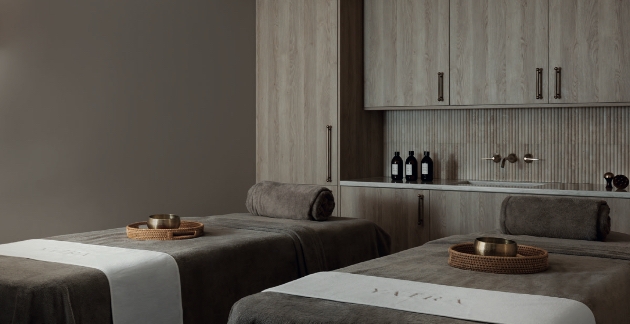 YATRA wellness retreat at Montcalm Mayfair spa with treatment rooms, yoga space, and hydro pool.