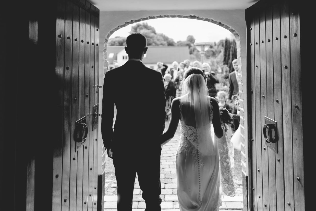 bride and groom leaving church