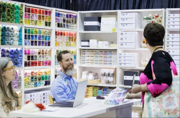 people discussing bright sewing yarns