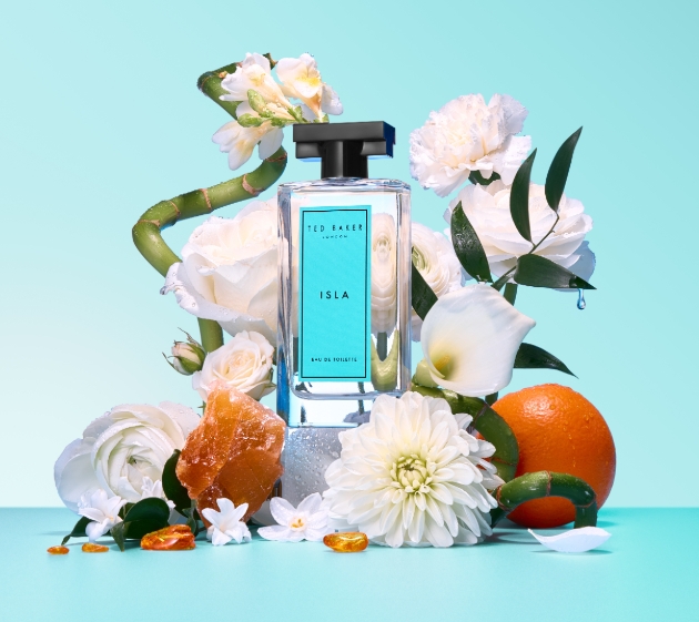 Ted Baker Isla clear bottle with blue label and black lid 